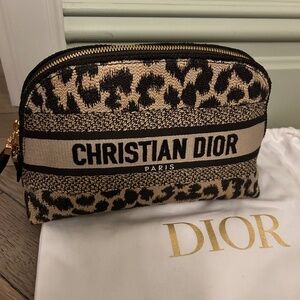 Christian Dior Leopard Printed Cloth Clutch (New; $800)